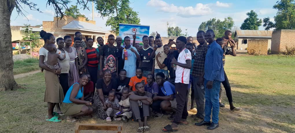 GCMHSC team gathered with community members in Lira during outreach